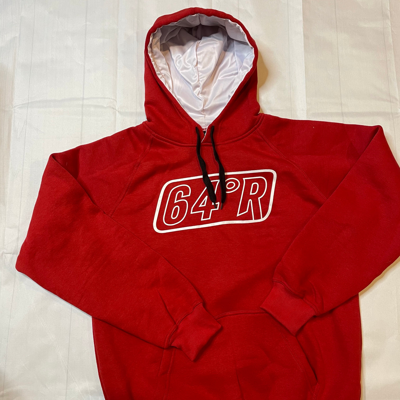 Red hoodie with white logo